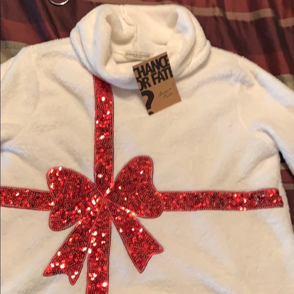 White with red bow sweater